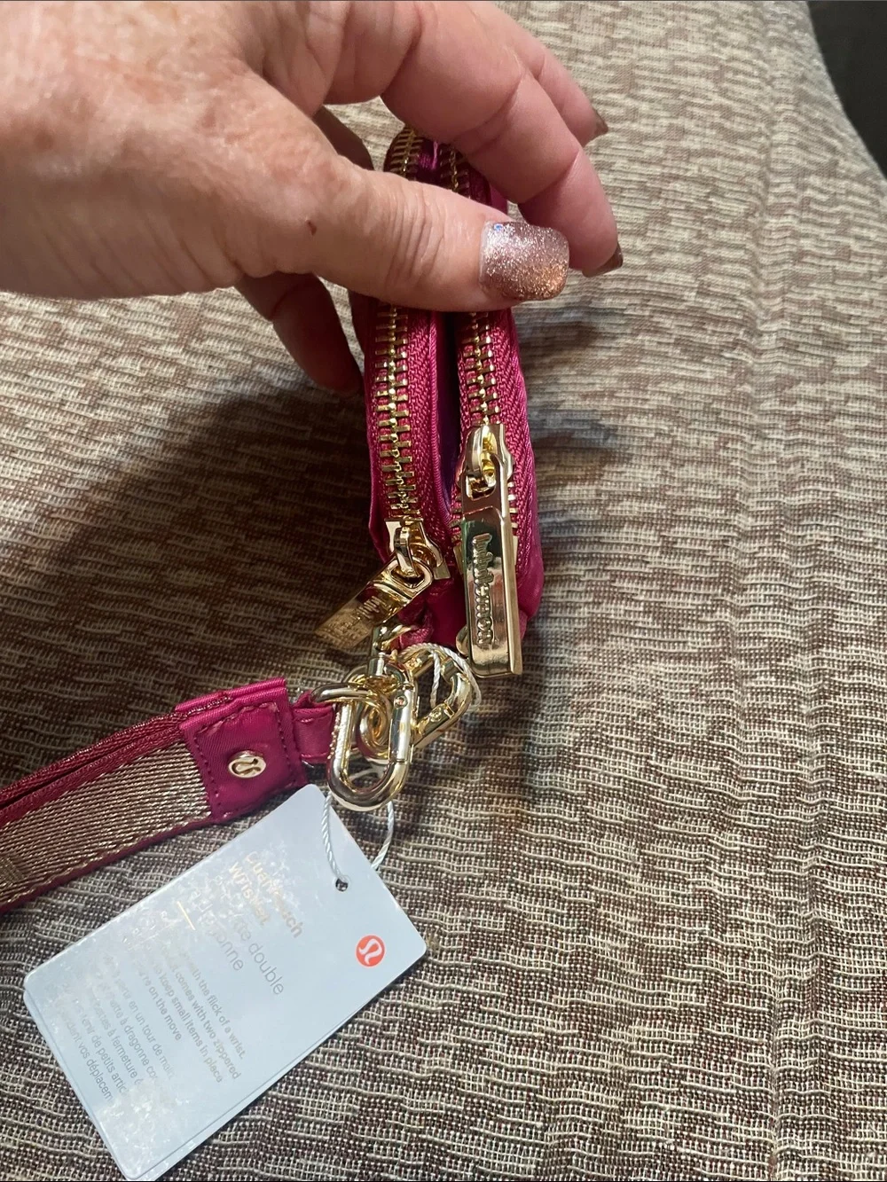lululemon athletica pink dual pouch wristlet with logo strap